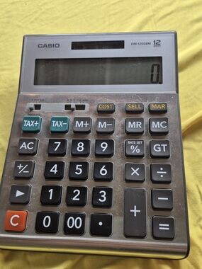 Casio Silver and Black Desktop Calculator with Green Tax Keys